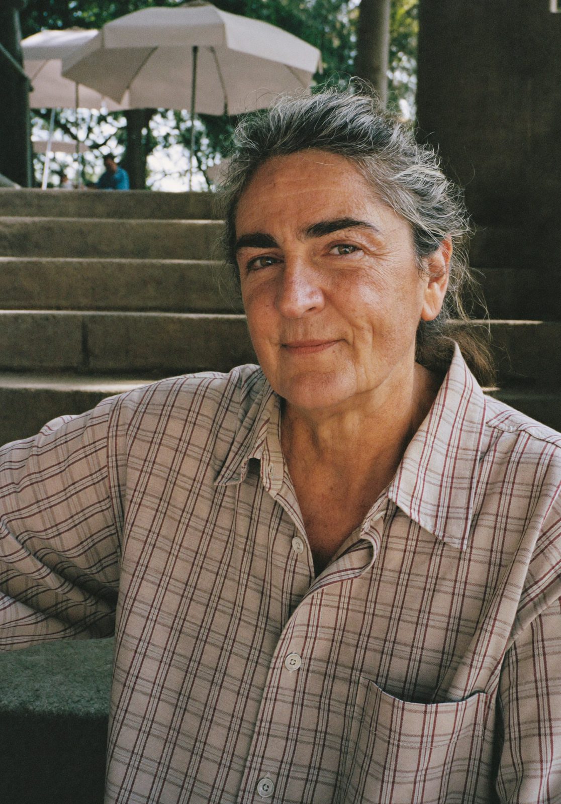 Ottavia Sereni, the host, on the stone steps in Capalbio